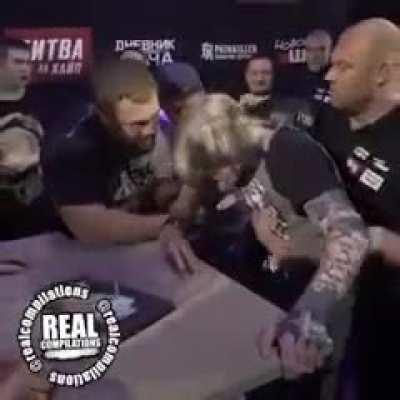 Entering a slapping competition out of his weight class