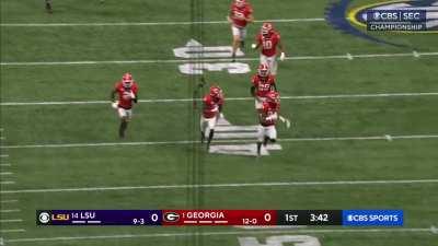 UGA safety Christopher Smith II lets the blocked kick roll just before it becomes a dead ball and returns it for a touchdown
