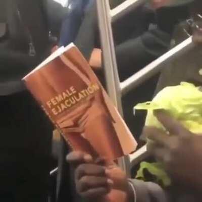 Scarfing down lettuce while doing some light reading.