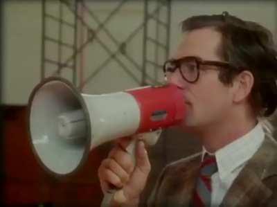 Michael J. Fox learning some killer licks behind the scenes on Back to the future. 1985