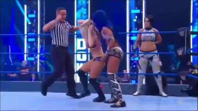 Alexa enters the ring so cute and confident only to be humiliated by Bailey and Sasha in the corner