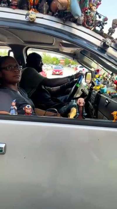 Car with over 3,000 action figures and dolls