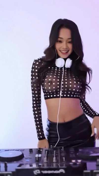 Sexy asian DJ showing tits