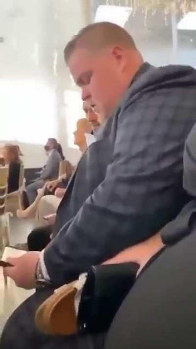 My buddy checking his Doge balance during a wedding ceremony... LOL