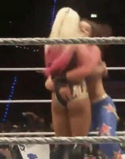 Alexa Bliss takes a belly-to-belly and a wedgie