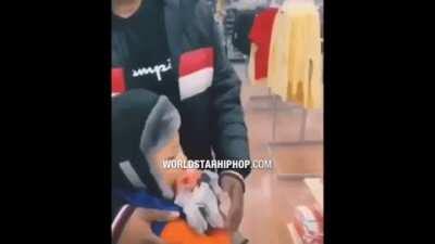 Dumbass gets mad at baby's father cuz he buys the kid clothes from Walmart