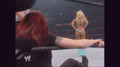 Torrie Wilson gives herself a wedgie
