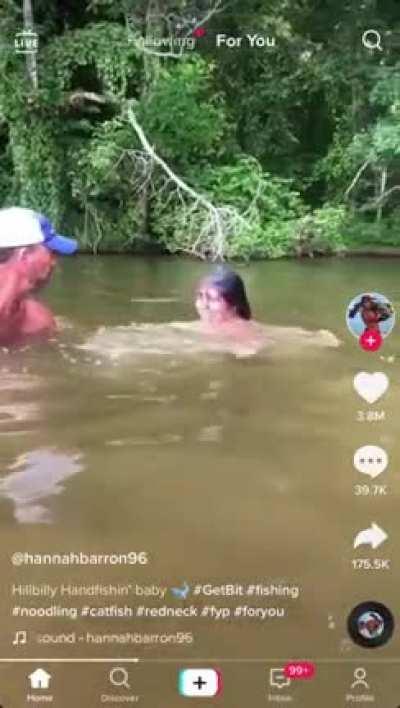This father and daughter noodling and came away with this catfish