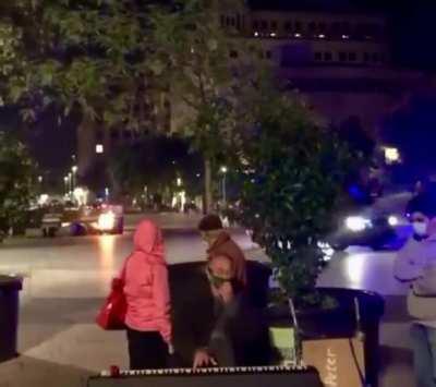 A true stoic, playing on amidst the chaos of modern existence.