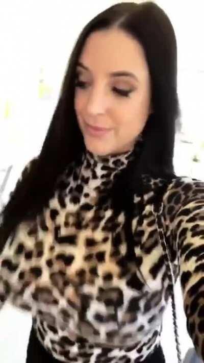 Bouncing breasts in a leopard sweater