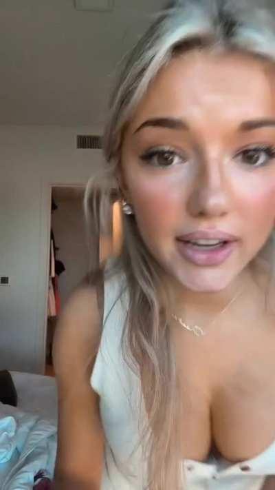 Breckie Hill in a white dress