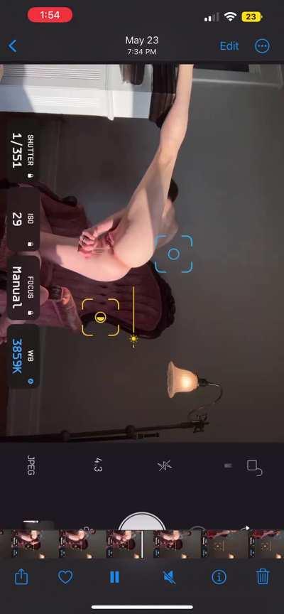 Fucking herself with a dildo