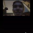 Kid slides down stairs into vase