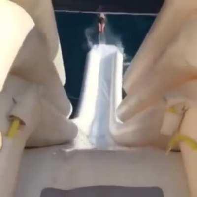 Down a water slide backwards