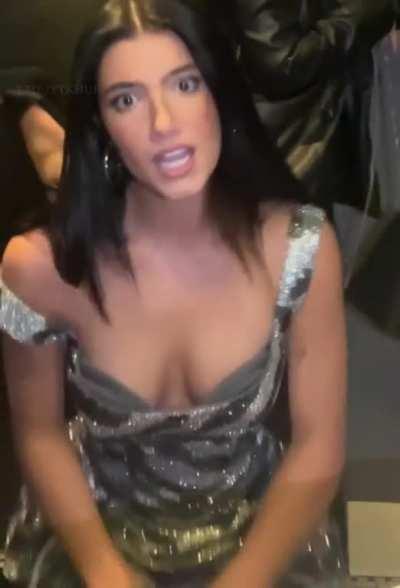 Charlis tits about to slip out😩