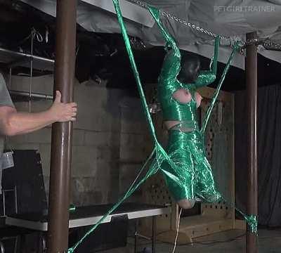 A cocoon of plastic wrap and tape. Forced to orgasm from the wand on her clit. Her tits will get the whip in the morning.
