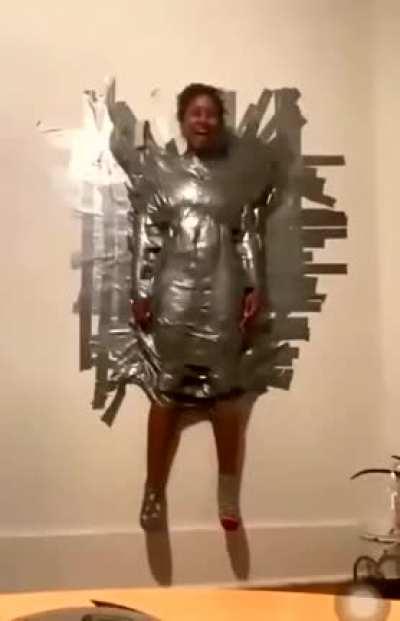 WCGW being taped to a wall