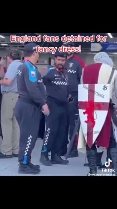 England fans escorted away from the stadium by police for wearing crusader outfits