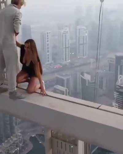 Hanging off buildings all for the gram