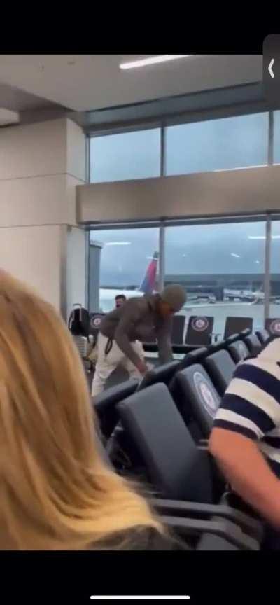 Young Rapper Performs at Airport