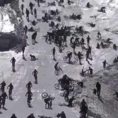 Bicyclists on a Ski Slope
