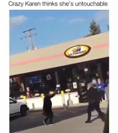 Karen tries to attack police officer