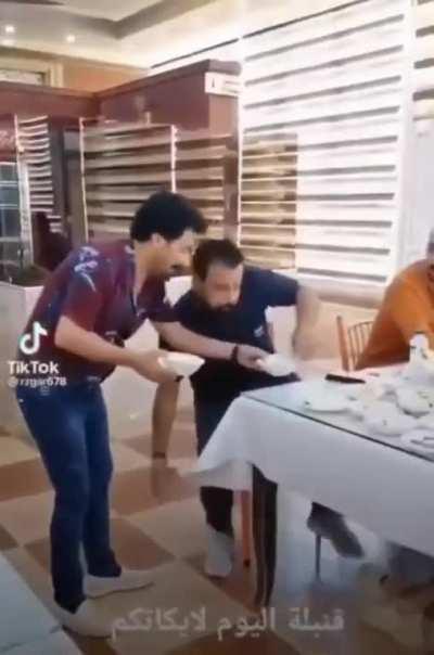 This waiter having a laugh with (some) customers