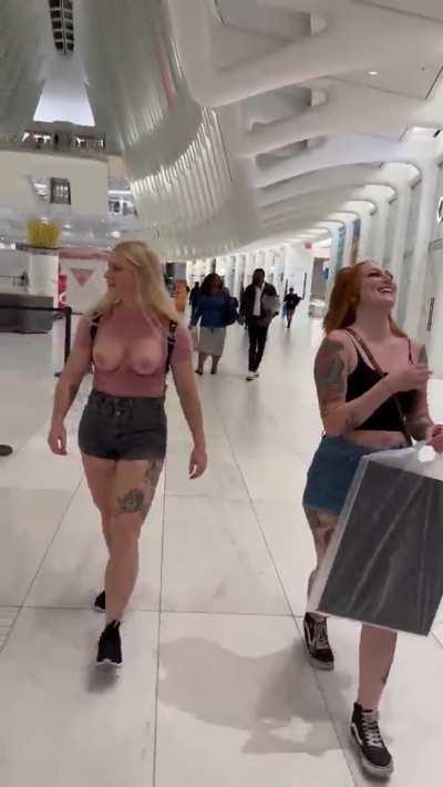 tits out at the airport