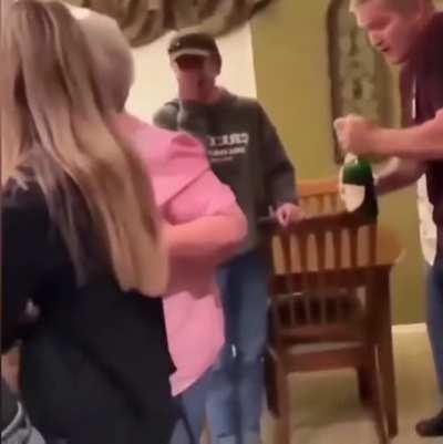 Not the smartest place to open the bottle