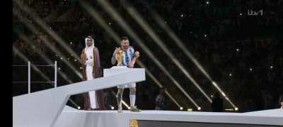 player of the tournament kisses the world cup trophy
