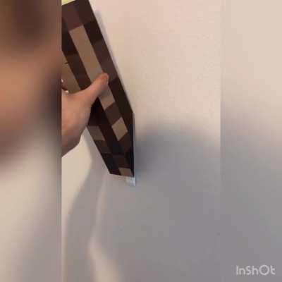 Designed and 3D printed an IRL wooden Minecraft torch for a buddy of mine