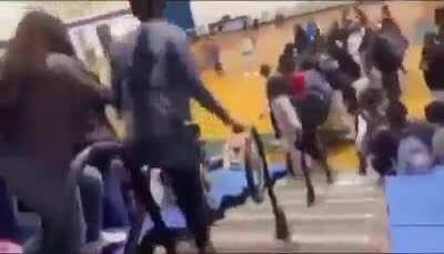 This chick crazy. Woman got Yeeted 50 feet down the bleachers.