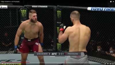 Jiri uses his forehead to block Volkan's jabs