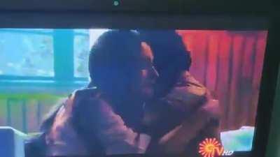 What an innovative way to censor a kiss scene