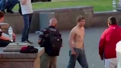 Bald guy in a yellow fit knocks out the bad guy with a single punch. Where have we seen this before?