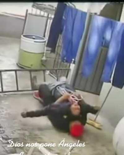 This guy catching his colleague after the ladder slipped.