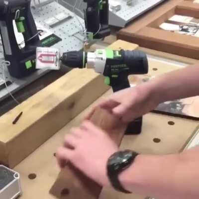 Turning screws inside a piece of wood using a magnetic drill