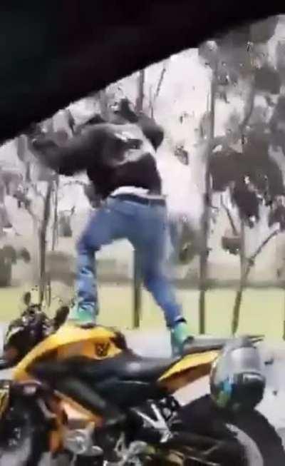 Standing on a moving bike