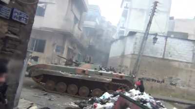 Posted Feb 1 2012. Early war Syria footage showing FSA rebels in Homs. Including use of a captured BMP 1.