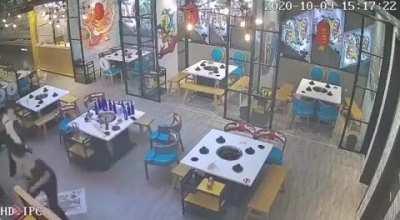 Chinese waitress kicked down two drunkards