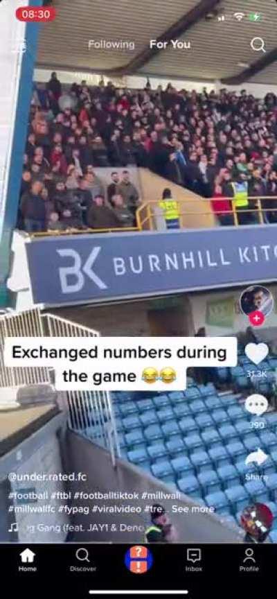 Rival fans exchanging numbers during the Millwall game