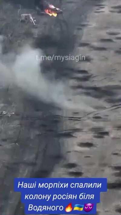 Russians escaping burning vehicle destroyed by AFU