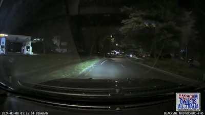 Car flies over roundabout, doesn't stick the landing