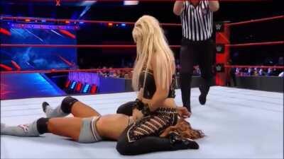 Dana brooke pinning Alicia Fox while sitting on her