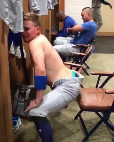 Baseball jock tossing it back