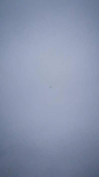 Russian missle flying over a girl in Ukraine