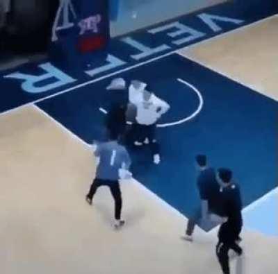 Dudes in a basketball court