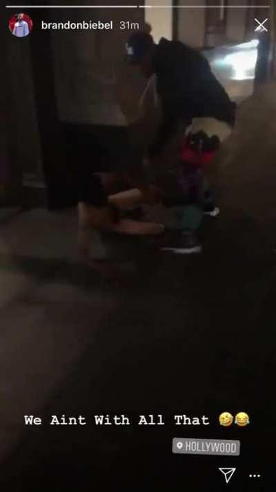 Naked guy strolling down Hollywood Blvd near kids gets a beat down