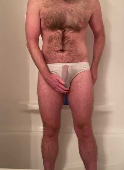 Wetting myself and revealing my hard cock