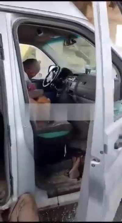 Bodies of Israeli civilians strewn along road